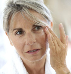 older-woman-applying-face-cream.jpg